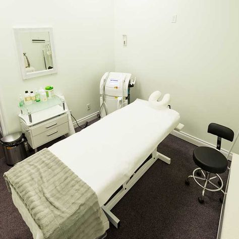 another spa room with a clean white bed